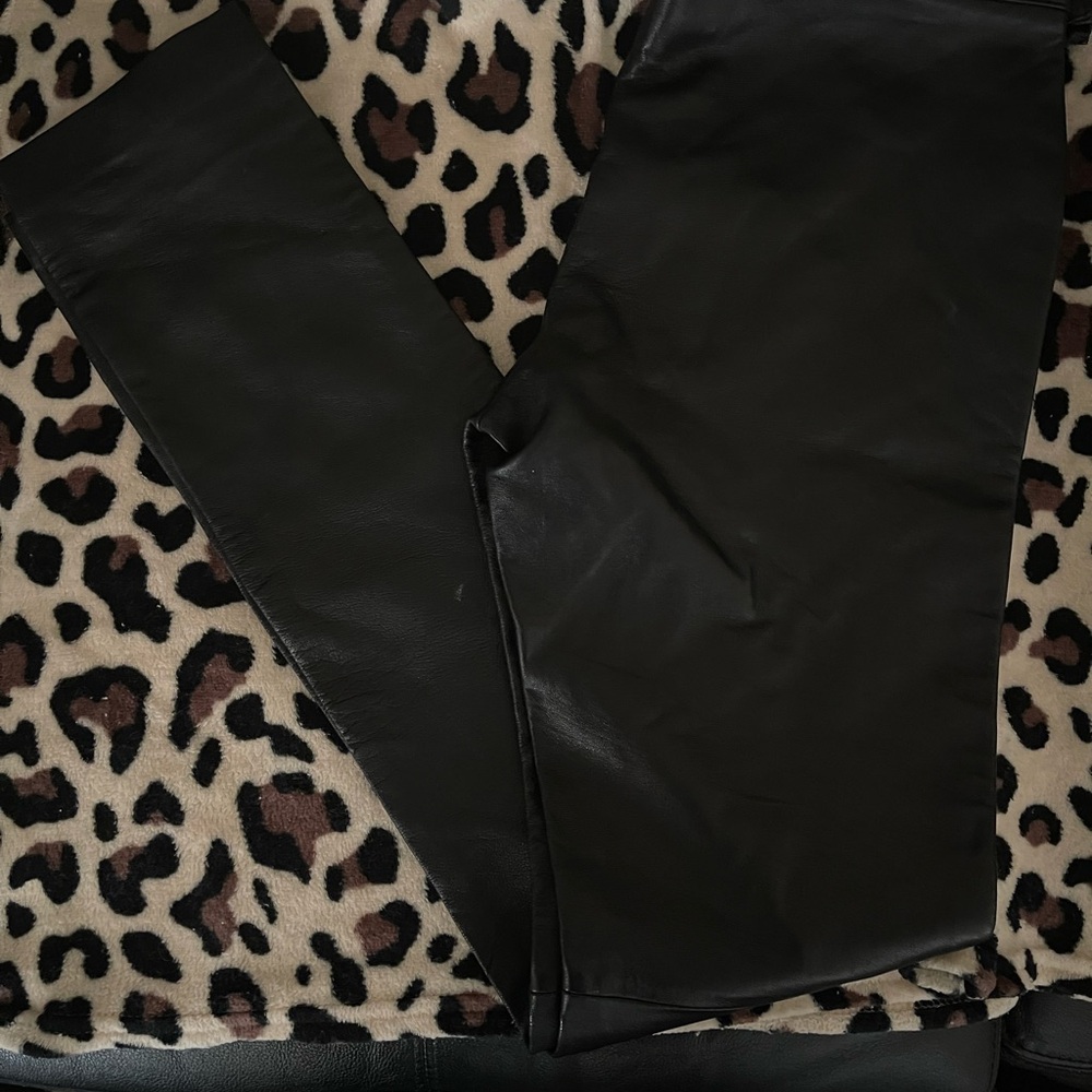 Never worn leather pants.  Fit nicely on booty.